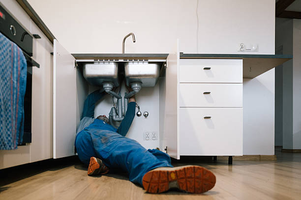 Professional Drain Cleaning technician working in Palm Beach Gardens, FL